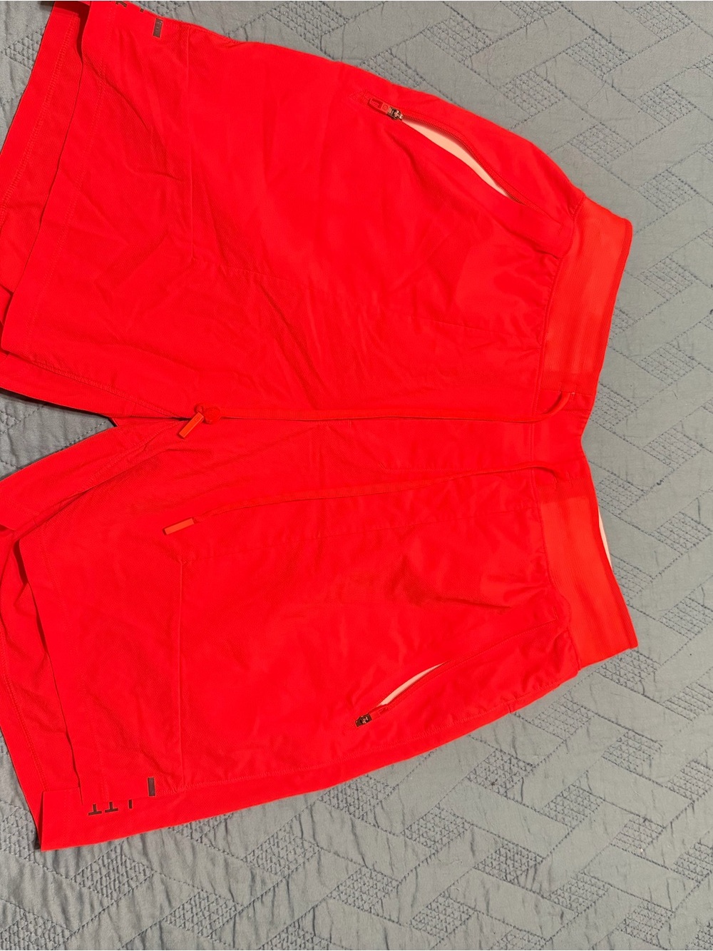 Lululemon Men’s warm Coral Athletic Shorts with Zip Pockets